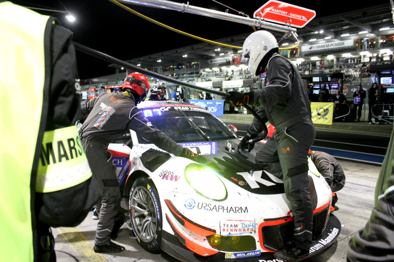 KÜS Team75 Bernhard’s fueler stands on the Porsche’s front splitter to fill the car up in the middle of the hood.